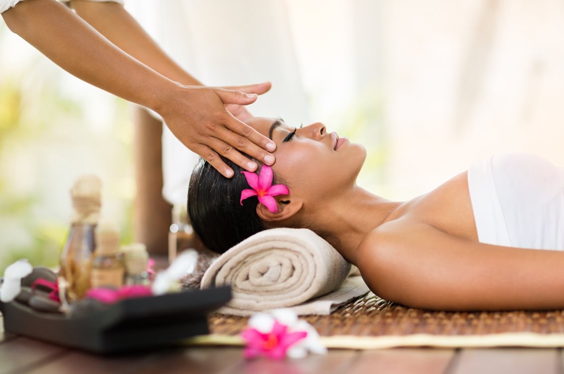 female getting recreation massage of head